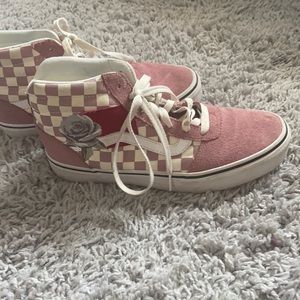 Pink high top checkered vans